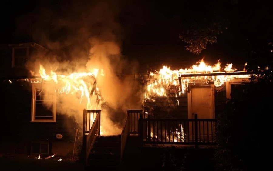 Dave Wilson/Aetna Hose, Hook and Ladder Company photograph the  intentional burning of the Chabad Center at the University of Delaware in an arson attack on Aug. 25, 2020