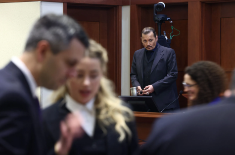 Depp looking at Heard in the courtroom. 