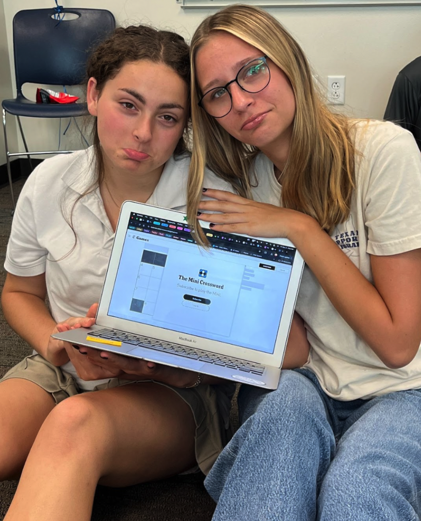 Seniors Darcy Sabloff and Avery Hildreth mourn the loss of the NYT Mini 
