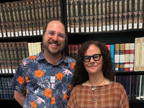 Judaic studies teachers, Rabbi Ari Vernon and Katherine Herman, in Rabbi Morgan’s classroom, continuing his legacy. 
