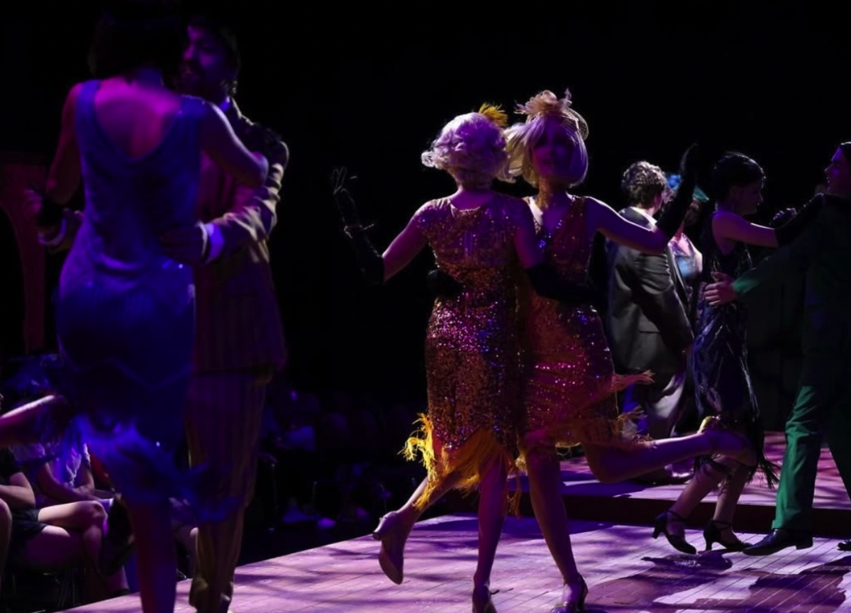 The cast of The Great Gatsby dances frantically during a party at Jay Gatsby’s extravagant house. 
