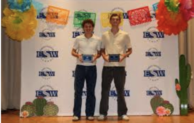 Anthony Ianello and Ethan Cox receiving the Triple Sport Athlete Award